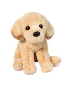 Plüschtier Labrador mit Fell in einem Beige-Ton in sitzender Pose.