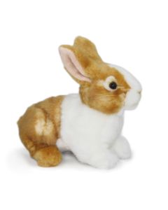 Kuscheltier Kaninchen sitzend mit braun-weißem Plüschfell.