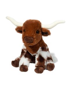 Sitzender Stofftier Stier mit braun-weißem Plüschfell im kindgerechtem Design